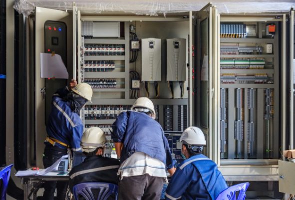 engineer working checking maintenance equipment wiring plc cabinet 29285 1084